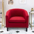 Poltrona a barilotto Accent, sedia da salotto con borchie e gambe in legno massiccio