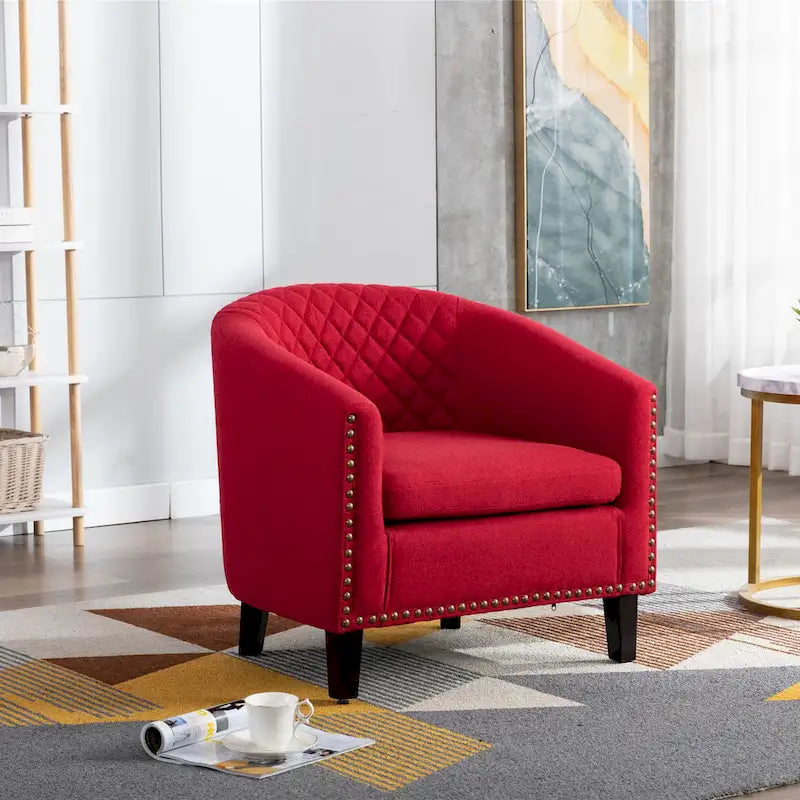 Poltrona a barilotto Accent, sedia da salotto con borchie e gambe in legno massiccio