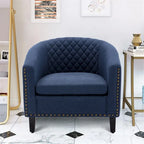 Poltrona a barilotto Accent, sedia da salotto con borchie e gambe in legno massiccio
