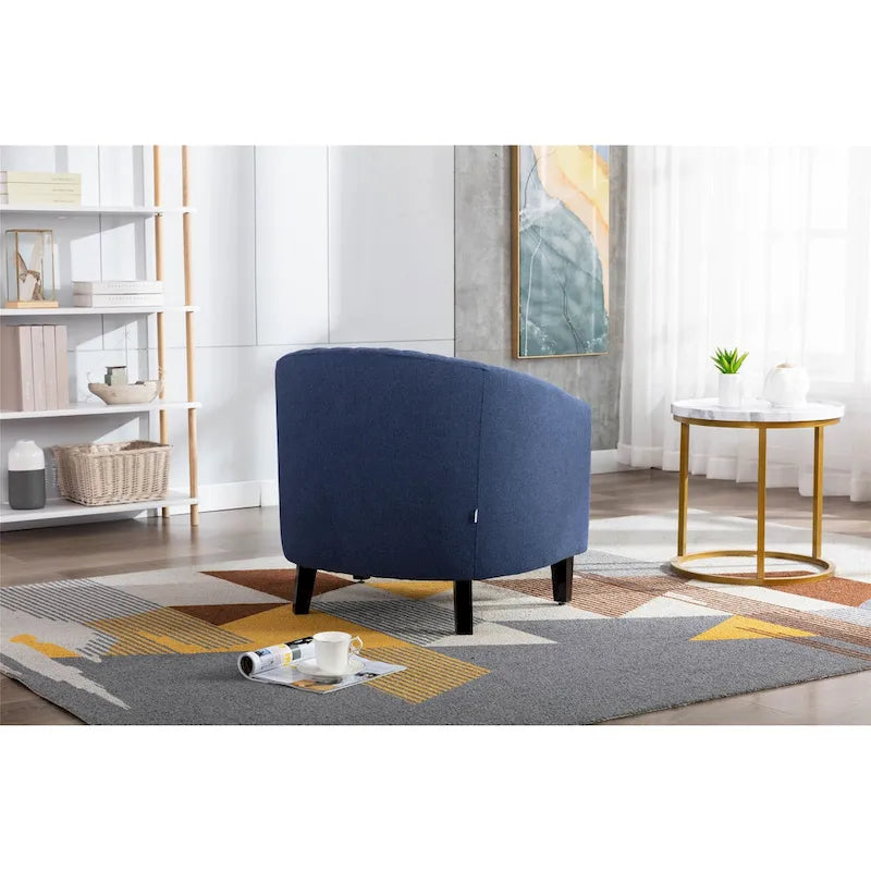 Poltrona a barilotto Accent, sedia da salotto con borchie e gambe in legno massiccio