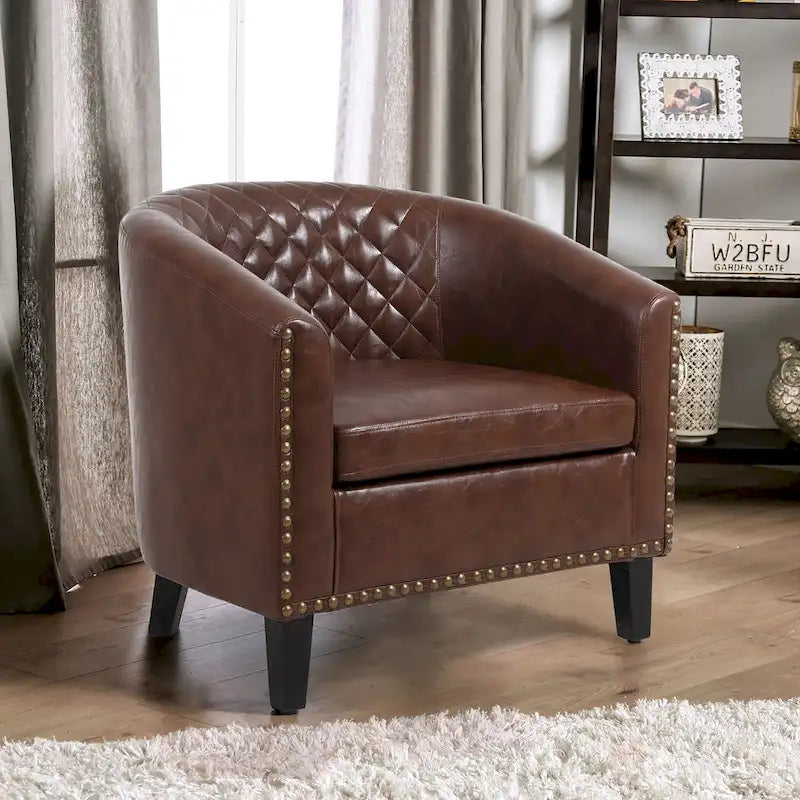 Poltrona a barilotto Accent, sedia da salotto con borchie e gambe in legno massiccio
